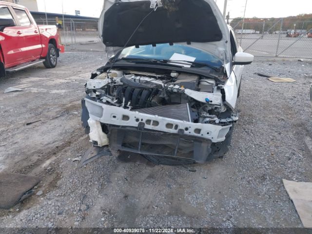 Photo 5 VIN: 1FADP3F24JL237555 - FORD FOCUS 