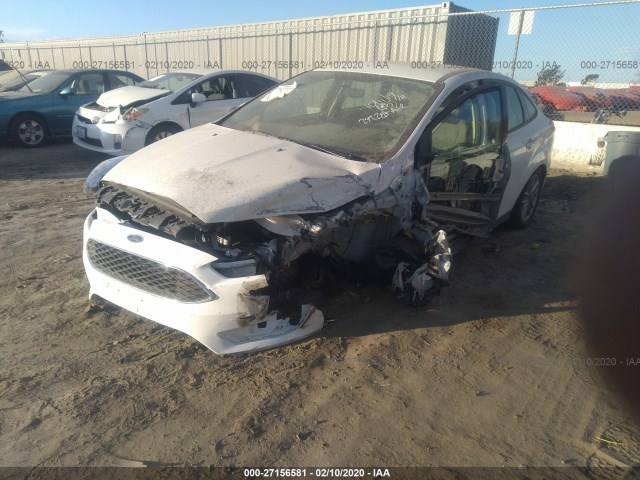 Photo 1 VIN: 1FADP3F24JL242285 - FORD FOCUS 