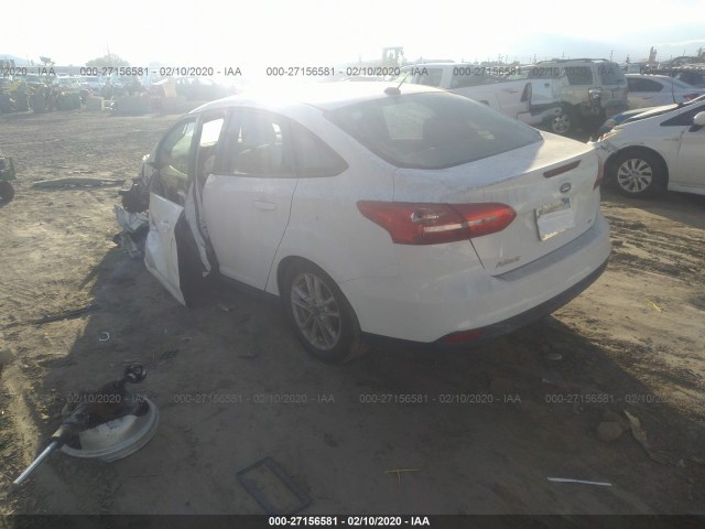 Photo 2 VIN: 1FADP3F24JL242285 - FORD FOCUS 