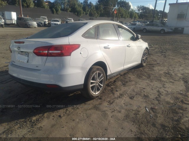 Photo 3 VIN: 1FADP3F24JL242285 - FORD FOCUS 