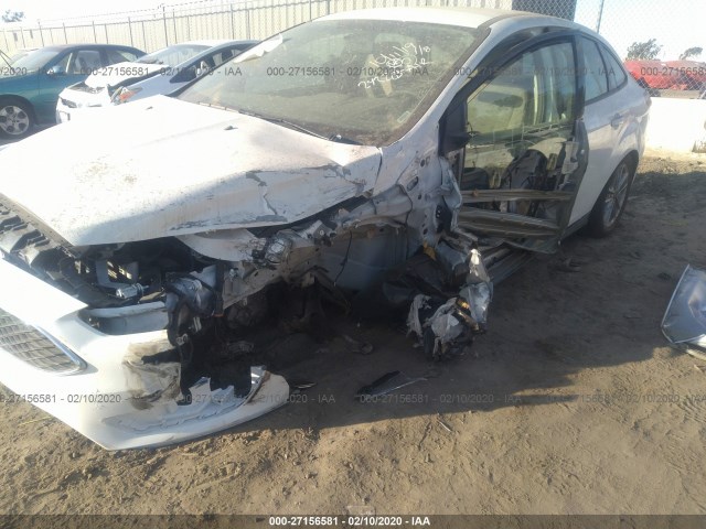 Photo 5 VIN: 1FADP3F24JL242285 - FORD FOCUS 