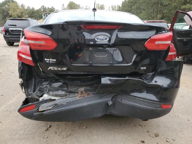 Photo 5 VIN: 1FADP3F24JL260317 - FORD FOCUS SE 