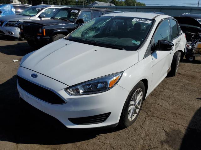 Photo 1 VIN: 1FADP3F24JL270748 - FORD FOCUS SE 