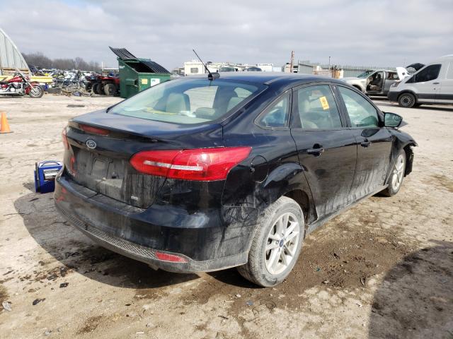 Photo 3 VIN: 1FADP3F24JL272418 - FORD FOCUS SE 