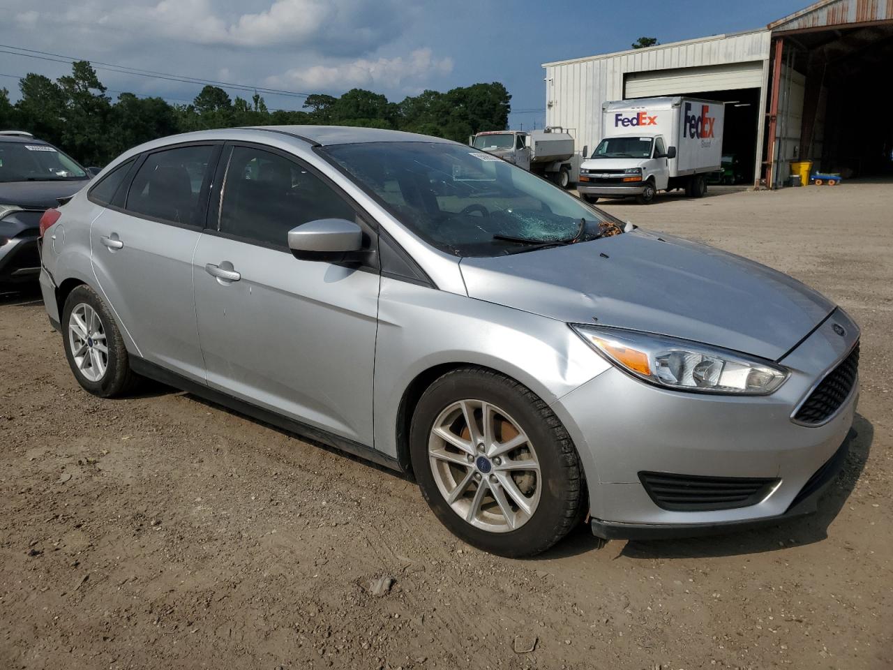 Photo 3 VIN: 1FADP3F24JL279949 - FORD FOCUS 