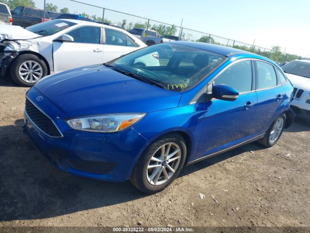 Photo 1 VIN: 1FADP3F24JL286142 - FORD FOCUS 