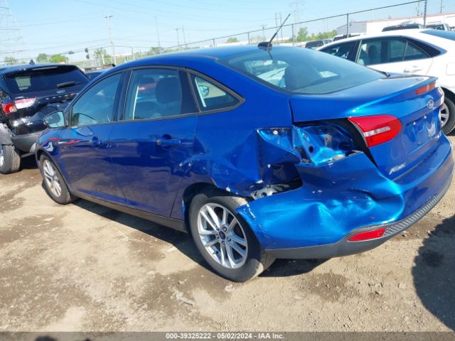 Photo 2 VIN: 1FADP3F24JL286142 - FORD FOCUS 