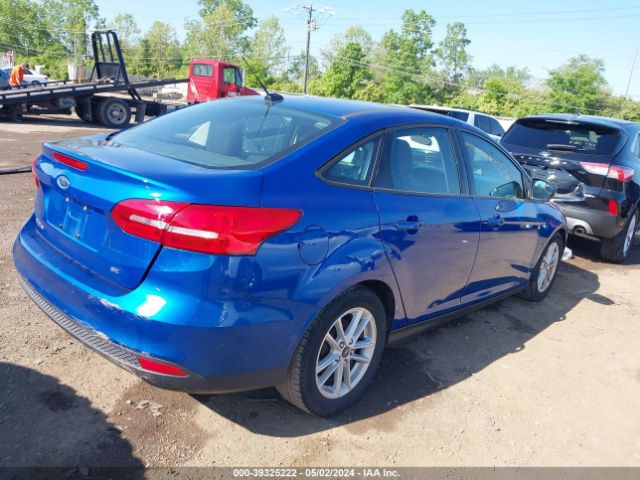 Photo 3 VIN: 1FADP3F24JL286142 - FORD FOCUS 