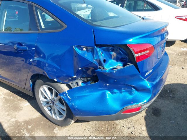 Photo 5 VIN: 1FADP3F24JL286142 - FORD FOCUS 