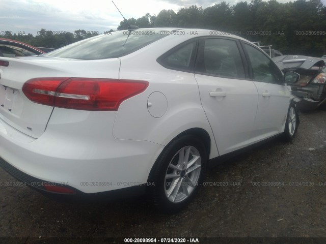 Photo 3 VIN: 1FADP3F24JL288604 - FORD FOCUS 