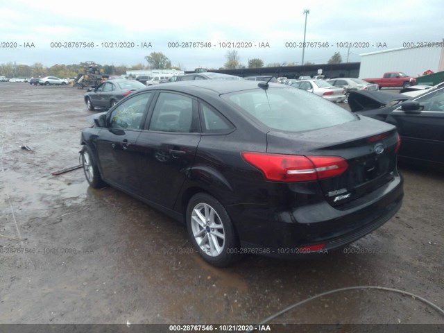 Photo 2 VIN: 1FADP3F24JL289008 - FORD FOCUS 