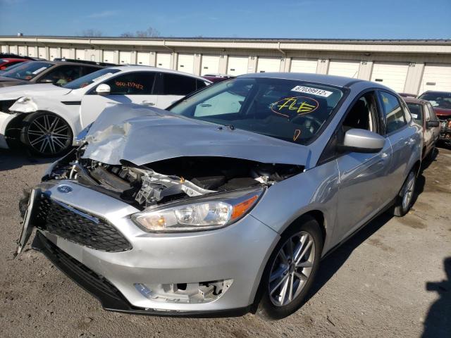 Photo 1 VIN: 1FADP3F24JL299523 - FORD FOCUS SE 