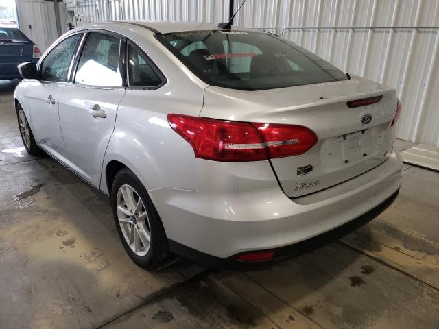 Photo 2 VIN: 1FADP3F24JL303733 - FORD FOCUS SE 