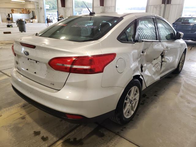 Photo 3 VIN: 1FADP3F24JL303733 - FORD FOCUS SE 