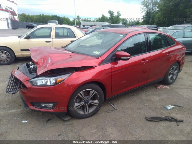 Photo 1 VIN: 1FADP3F24JL310147 - FORD FOCUS 