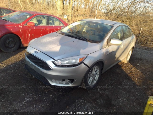 Photo 1 VIN: 1FADP3F24JL321830 - FORD FOCUS 