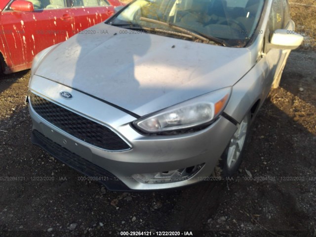 Photo 5 VIN: 1FADP3F24JL321830 - FORD FOCUS 