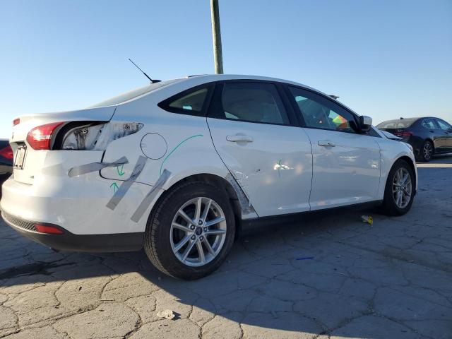 Photo 2 VIN: 1FADP3F24JL324582 - FORD FOCUS SE 