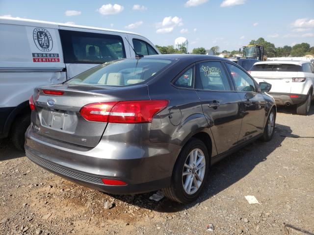 Photo 3 VIN: 1FADP3F24JL324789 - FORD FOCUS SE 