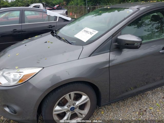 Photo 5 VIN: 1FADP3F25DL106011 - FORD FOCUS 