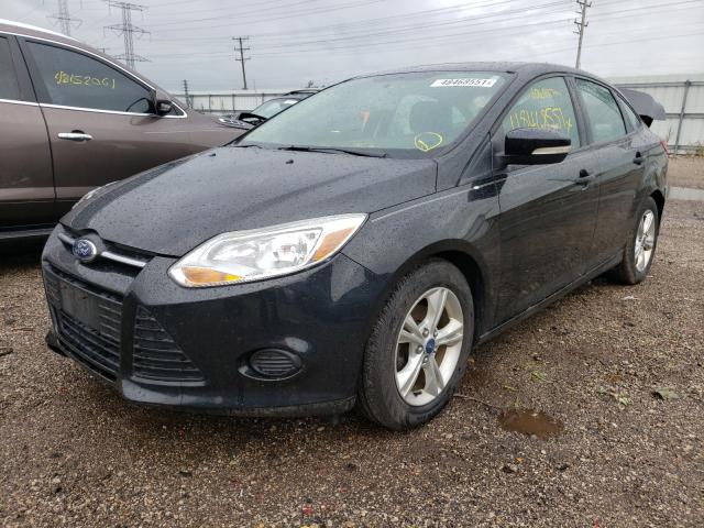 Photo 1 VIN: 1FADP3F25DL139803 - FORD FOCUS SE 