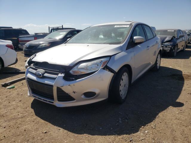 Photo 1 VIN: 1FADP3F25DL184000 - FORD FOCUS SE 