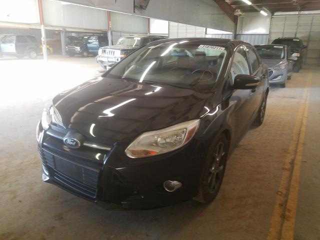 Photo 1 VIN: 1FADP3F25DL213799 - FORD FOCUS SE 