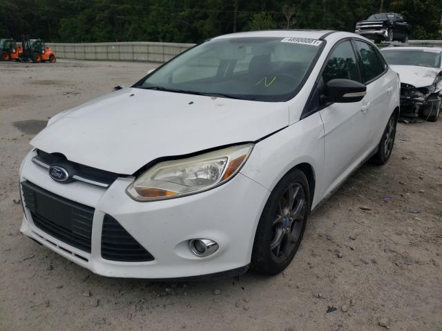 Photo 1 VIN: 1FADP3F25DL227749 - FORD FOCUS SE 