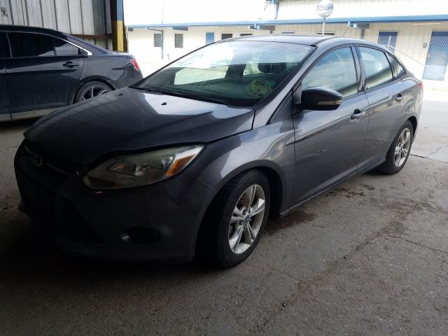 Photo 1 VIN: 1FADP3F25DL234619 - FORD FOCUS SE 