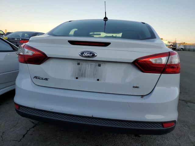 Photo 5 VIN: 1FADP3F25DL252022 - FORD FOCUS 