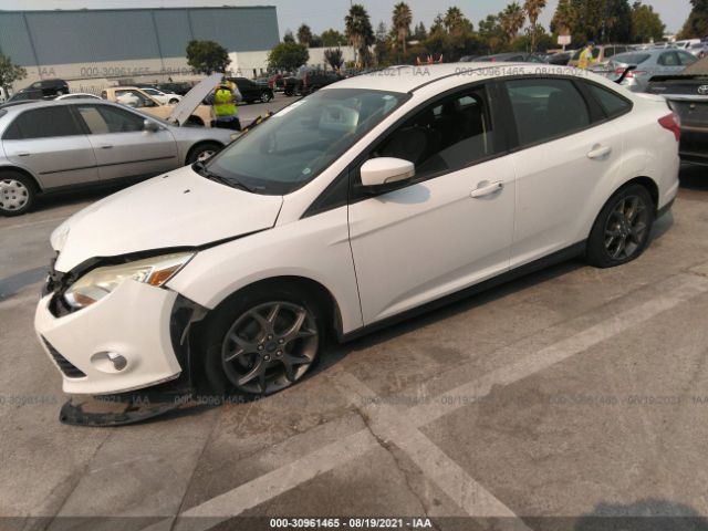 Photo 1 VIN: 1FADP3F25DL277406 - FORD FOCUS 