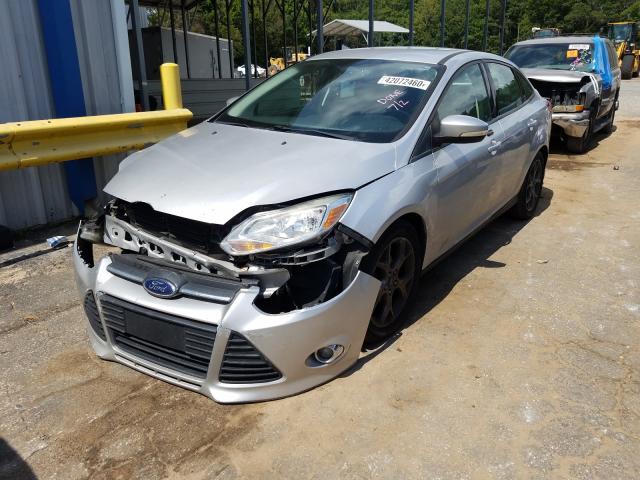 Photo 1 VIN: 1FADP3F25DL294450 - FORD FOCUS 