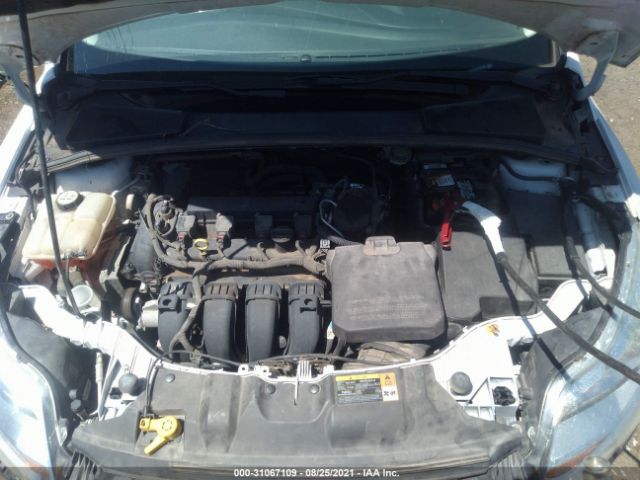 Photo 9 VIN: 1FADP3F25DL307150 - FORD FOCUS 