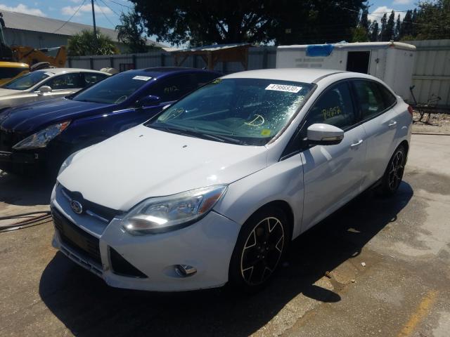 Photo 1 VIN: 1FADP3F25DL369793 - FORD FOCUS SE 