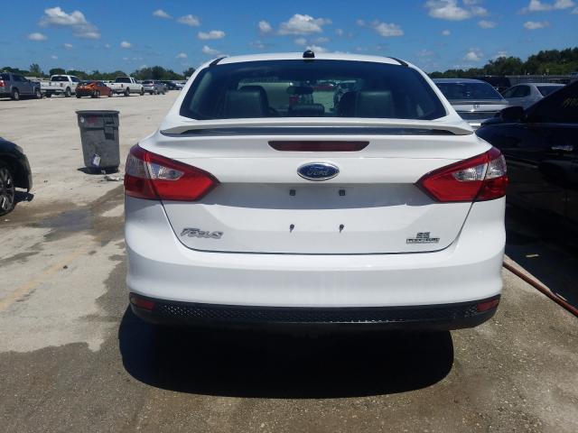 Photo 8 VIN: 1FADP3F25DL369793 - FORD FOCUS SE 