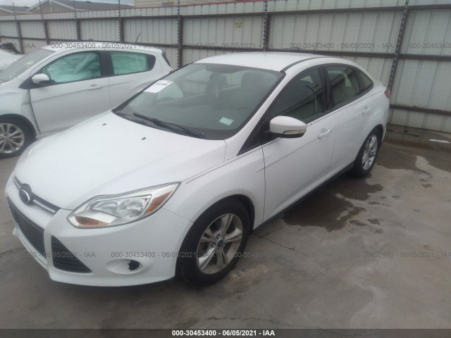 Photo 1 VIN: 1FADP3F25EL103627 - FORD FOCUS 