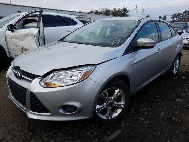 Photo 1 VIN: 1FADP3F25EL137261 - FORD FOCUS SE 