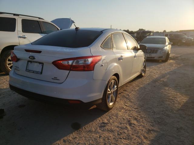 Photo 3 VIN: 1FADP3F25EL208409 - FORD FOCUS SE 