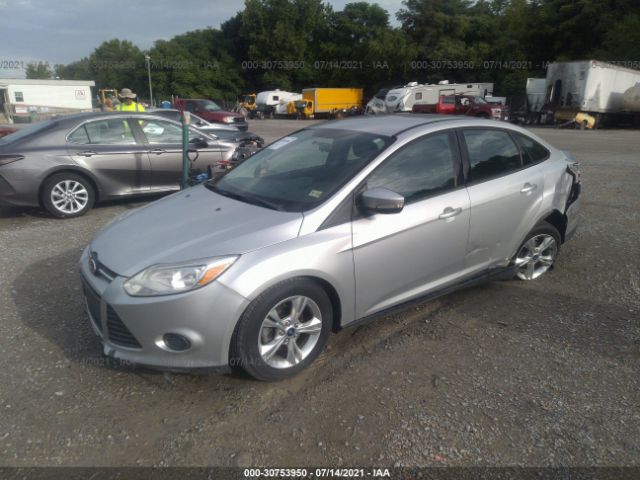 Photo 1 VIN: 1FADP3F25EL255973 - FORD FOCUS 