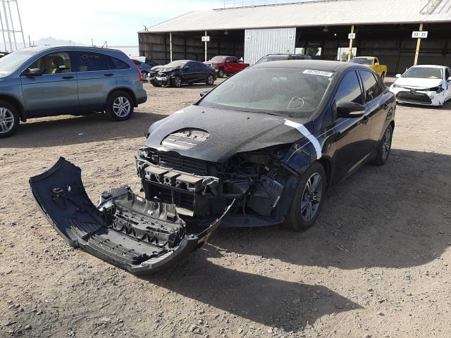 Photo 1 VIN: 1FADP3F25EL299228 - FORD FOCUS SE 