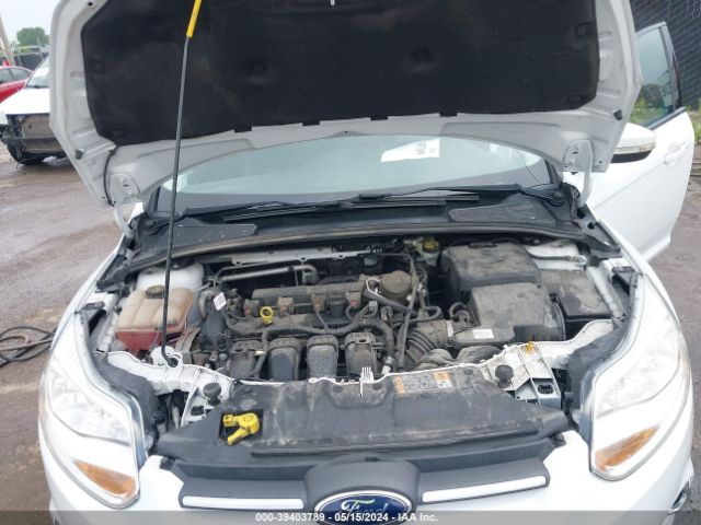 Photo 9 VIN: 1FADP3F25EL307120 - FORD FOCUS 