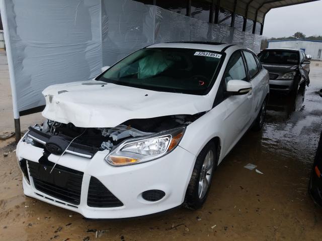 Photo 1 VIN: 1FADP3F25EL318070 - FORD FOCUS SE 