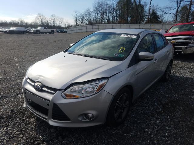 Photo 1 VIN: 1FADP3F25EL338447 - FORD FOCUS SE 