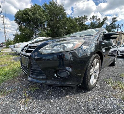 Photo 1 VIN: 1FADP3F25EL448401 - FORD FOCUS SE 