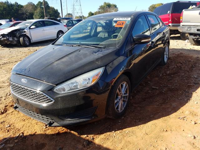 Photo 1 VIN: 1FADP3F25FL204037 - FORD FOCUS SE 