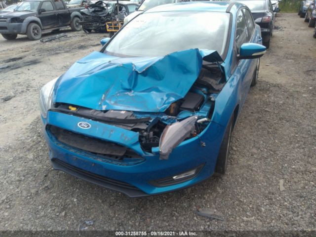 Photo 5 VIN: 1FADP3F25FL208024 - FORD FOCUS 