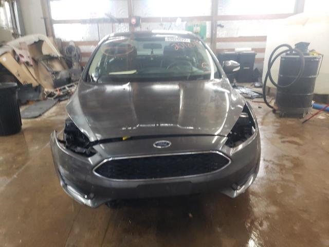 Photo 4 VIN: 1FADP3F25GL201804 - FORD FOCUS SE 