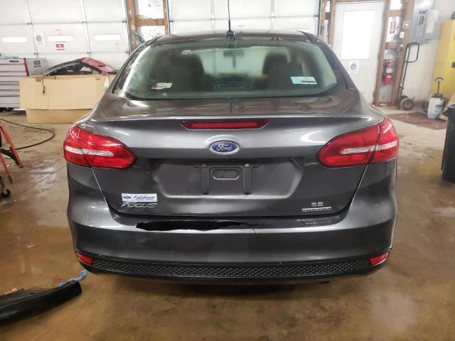 Photo 5 VIN: 1FADP3F25GL201804 - FORD FOCUS SE 