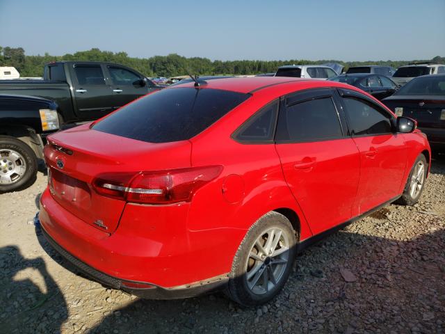 Photo 3 VIN: 1FADP3F25GL203987 - FORD FOCUS SE 