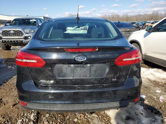 Photo 5 VIN: 1FADP3F25GL204640 - FORD FOCUS SE 